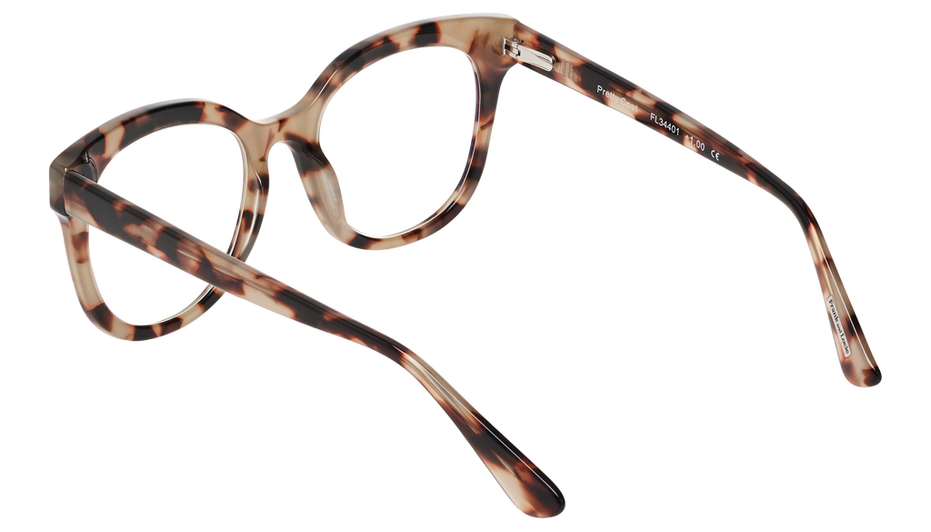 Side view of Frank and Lucie Eyedo reader glasses in Pretty Coat – slim temples and timeless tortoise pattern
