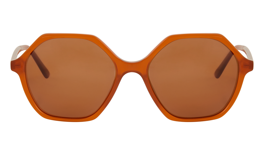 Front view of Frank and Lucie Eyewill sunglasses in Roussillon – sculpted temples and octagonal lenses in translucent warm brown frame